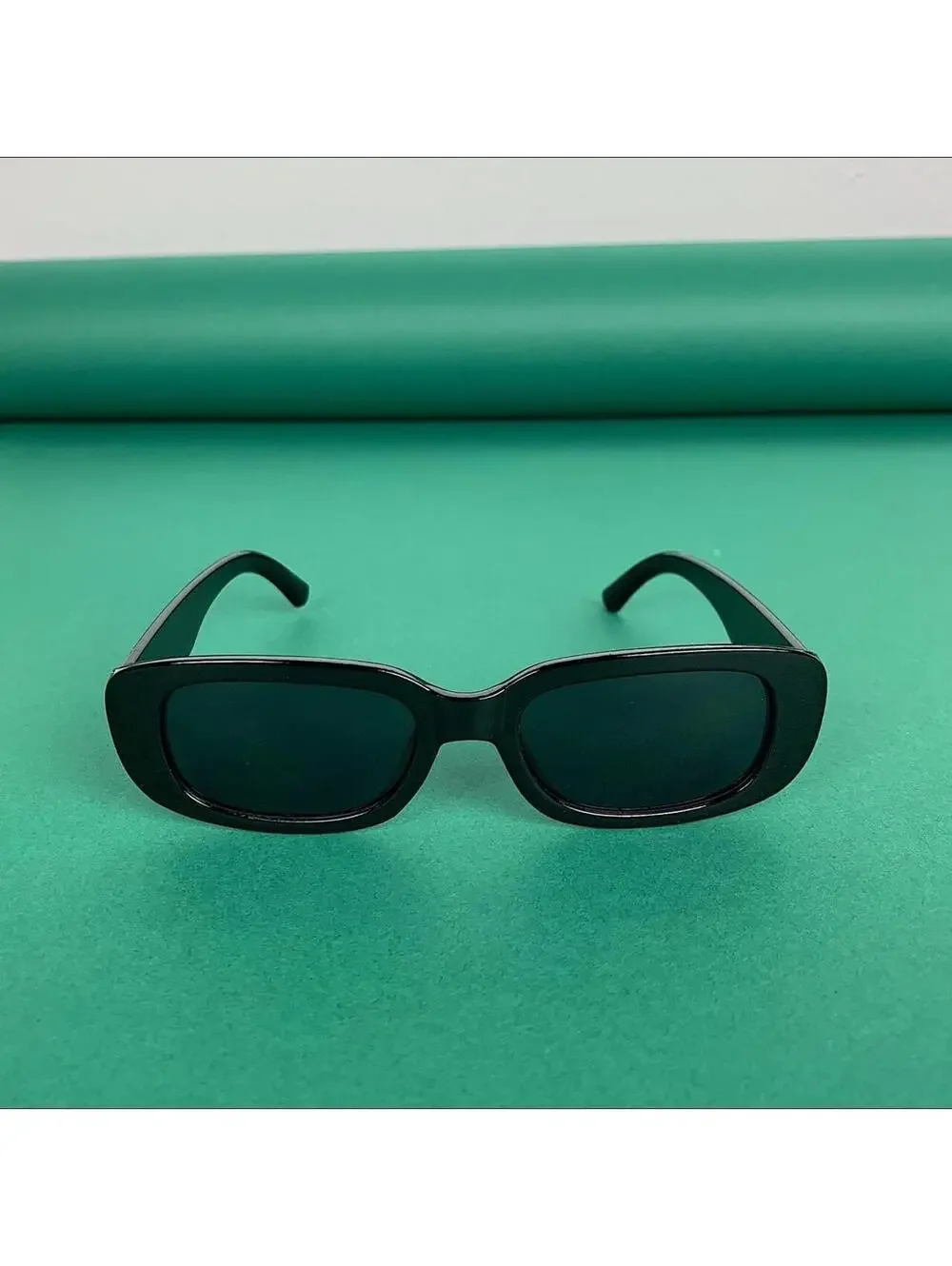 Minimalistic black sunglasses. UVA UVB protection